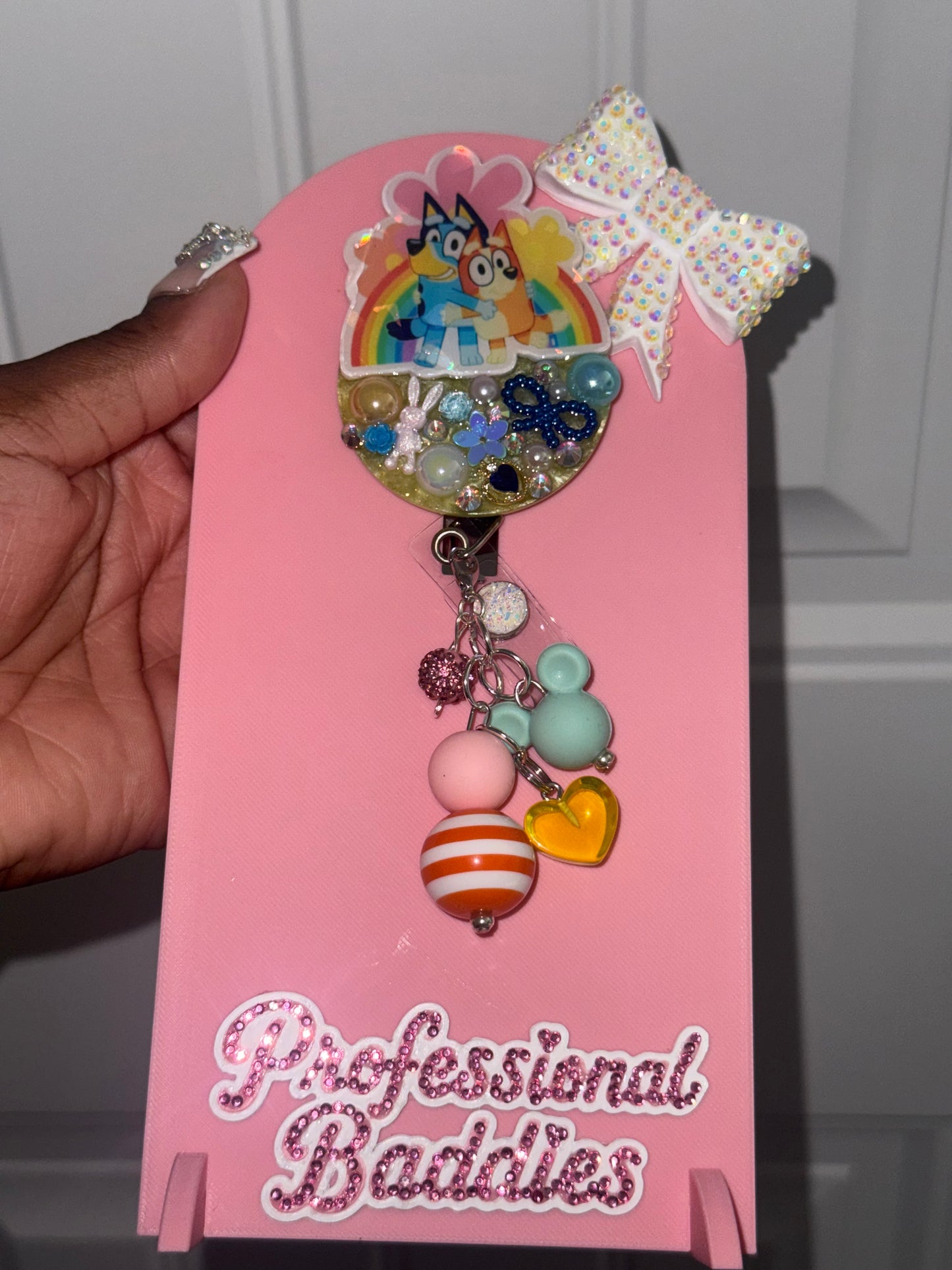 Rainbow and dogs boujee junk badge reel