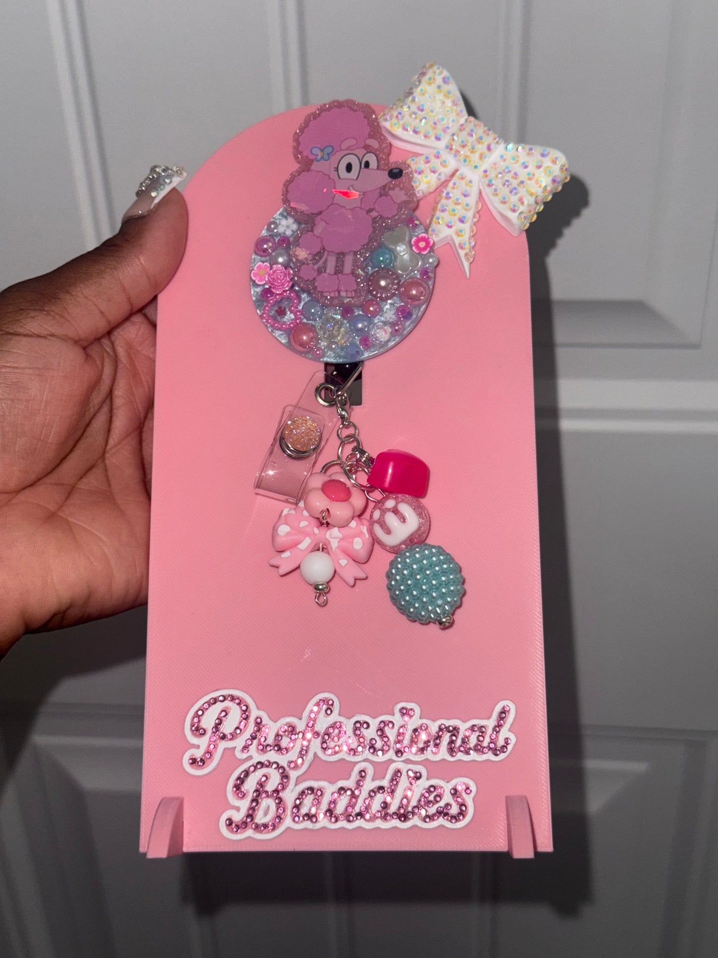 Pink dog boujee junk badge reel