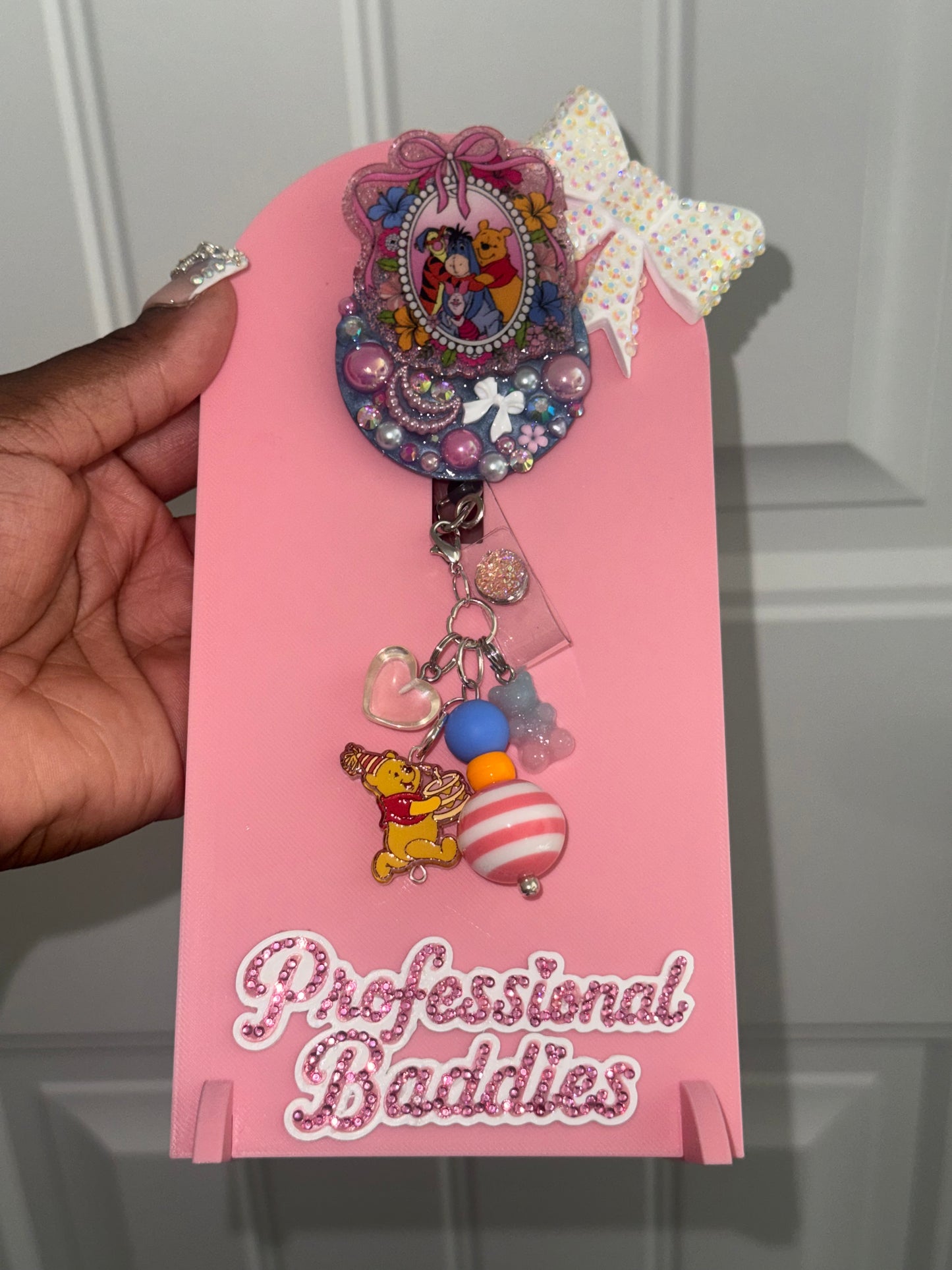 Pooh and friends junk badge reel