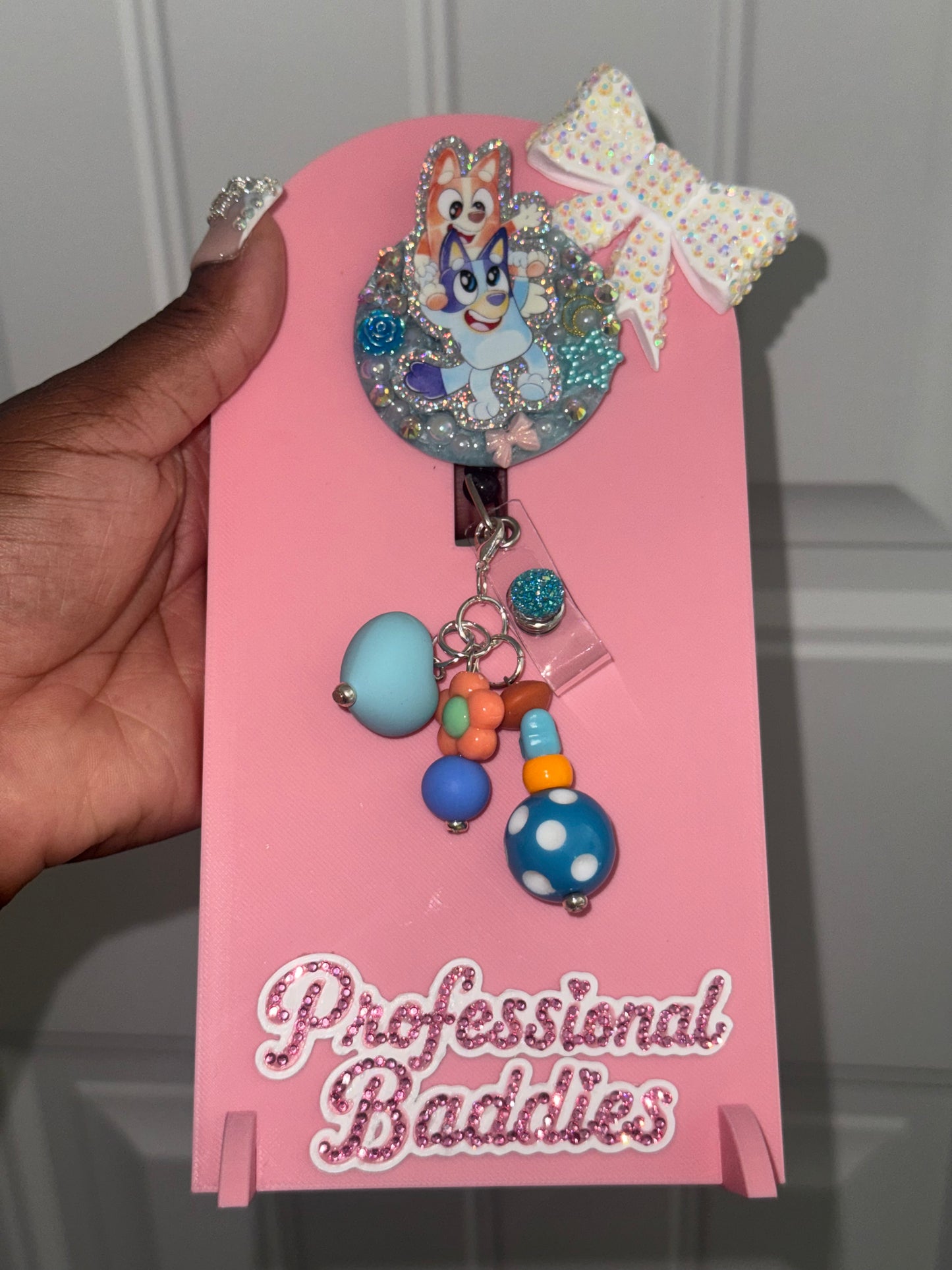 Blue and orange dog boujee junk badge reel