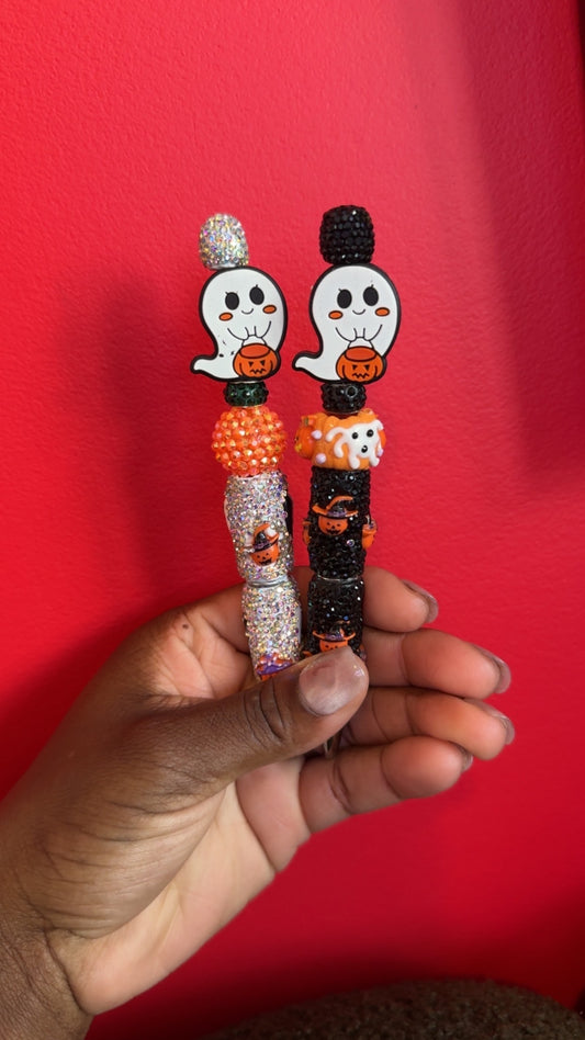 Ghost holding pumpkin bling pen