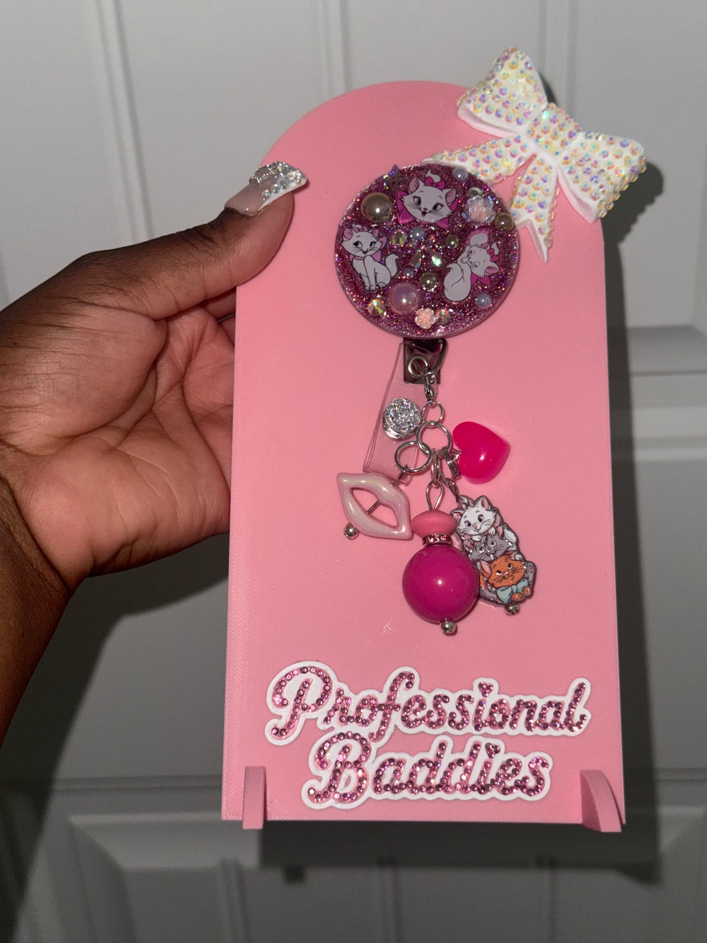 White cat boujee junk badge reel