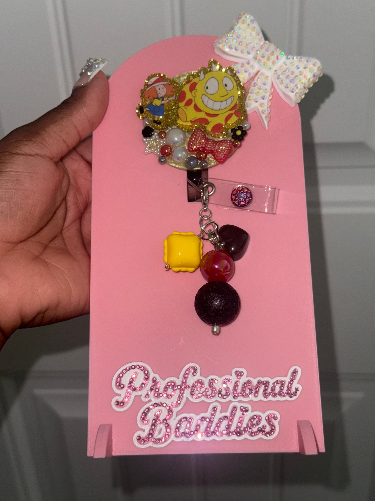 Maggie boujee junk badge reel