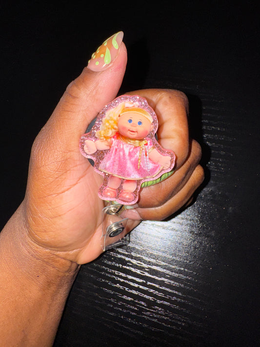 Pink dress cabbage doll